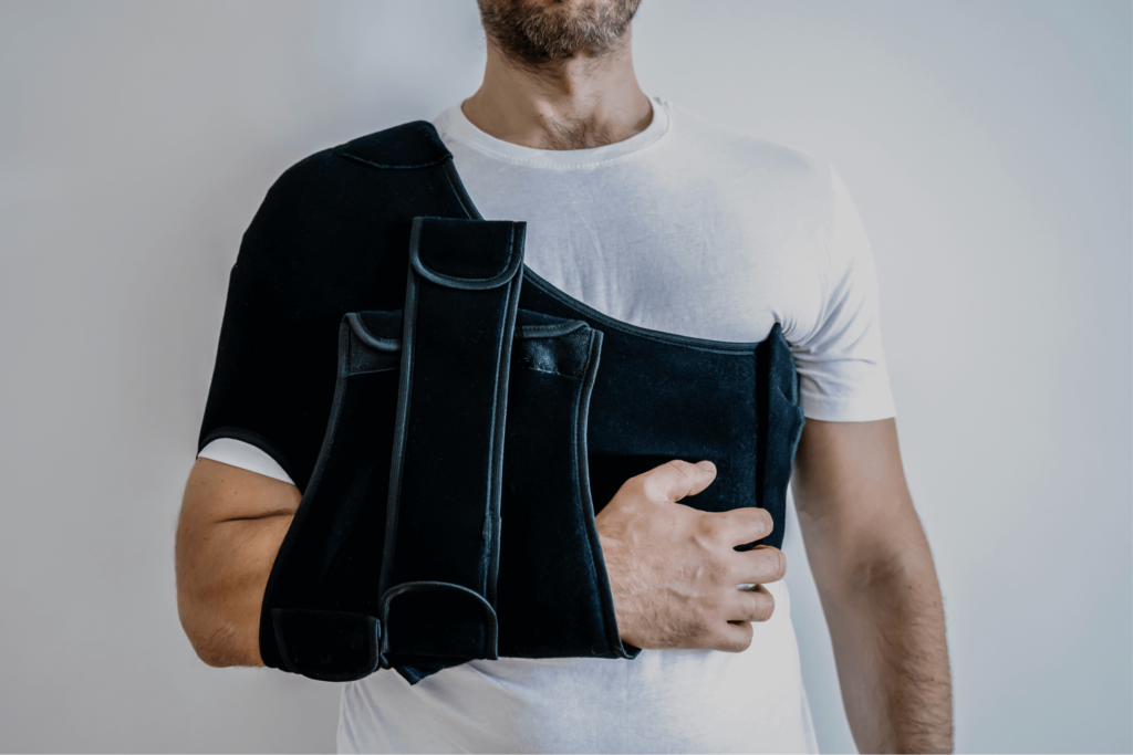 Doctor discussing non-operative treatment options for shoulder osteoarthritis with a patient, highlighting physical therapy, medications, and lifestyle modifications